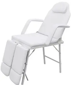 White treatment chair with ajustable legrests